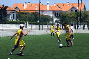 Peter and Paul play soccer in Costa Nova with the Ilhavo team.